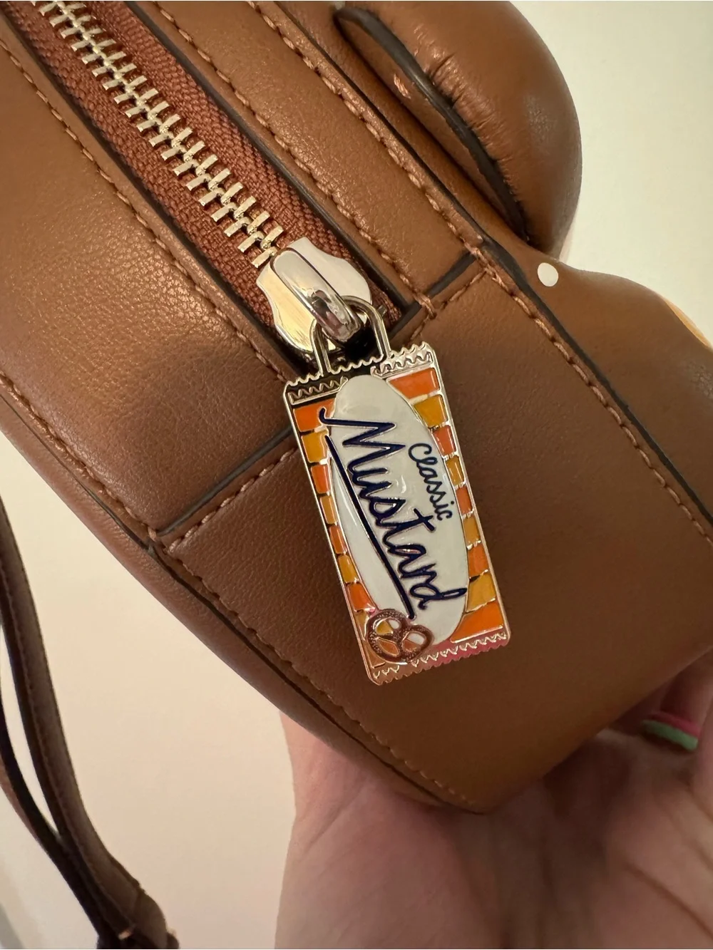 kate spade Brown & Cream Pretzel-Shaped Crossbody Bag with Mustard Packet Zipper - Picture 15 of 17